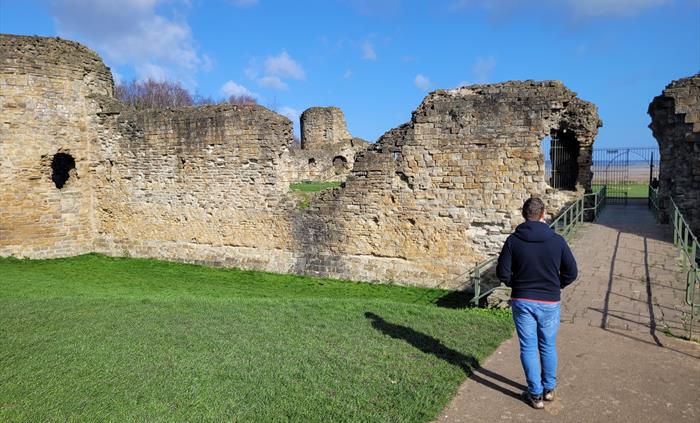 A person inside a castle wall
